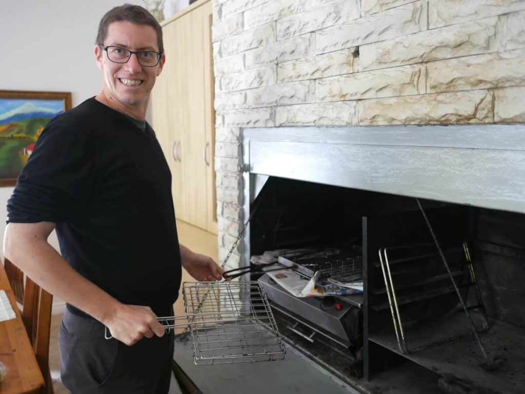 Benoit getting prepared to use a built-in grill