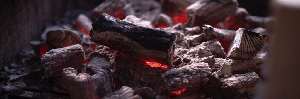 Burning lump charcoal